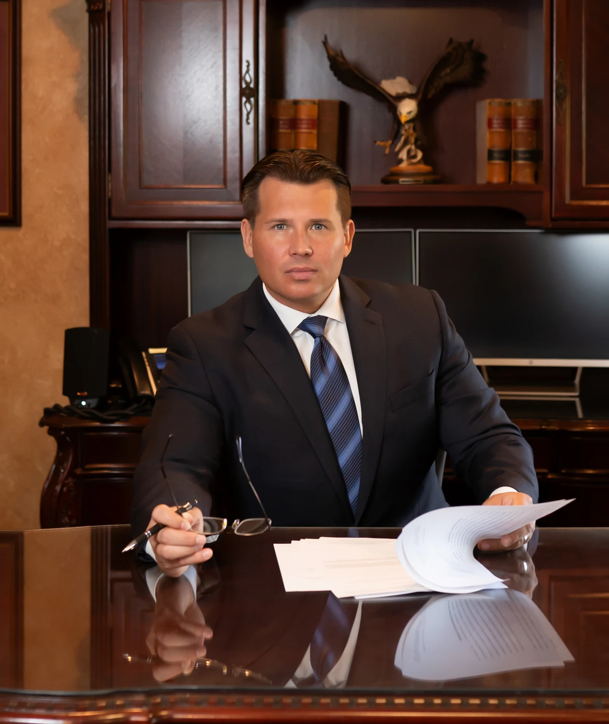 Attorney Jed Main of The Main Law Firm reviewing case documents for truck accident clients in Orlando and Central Florida.
