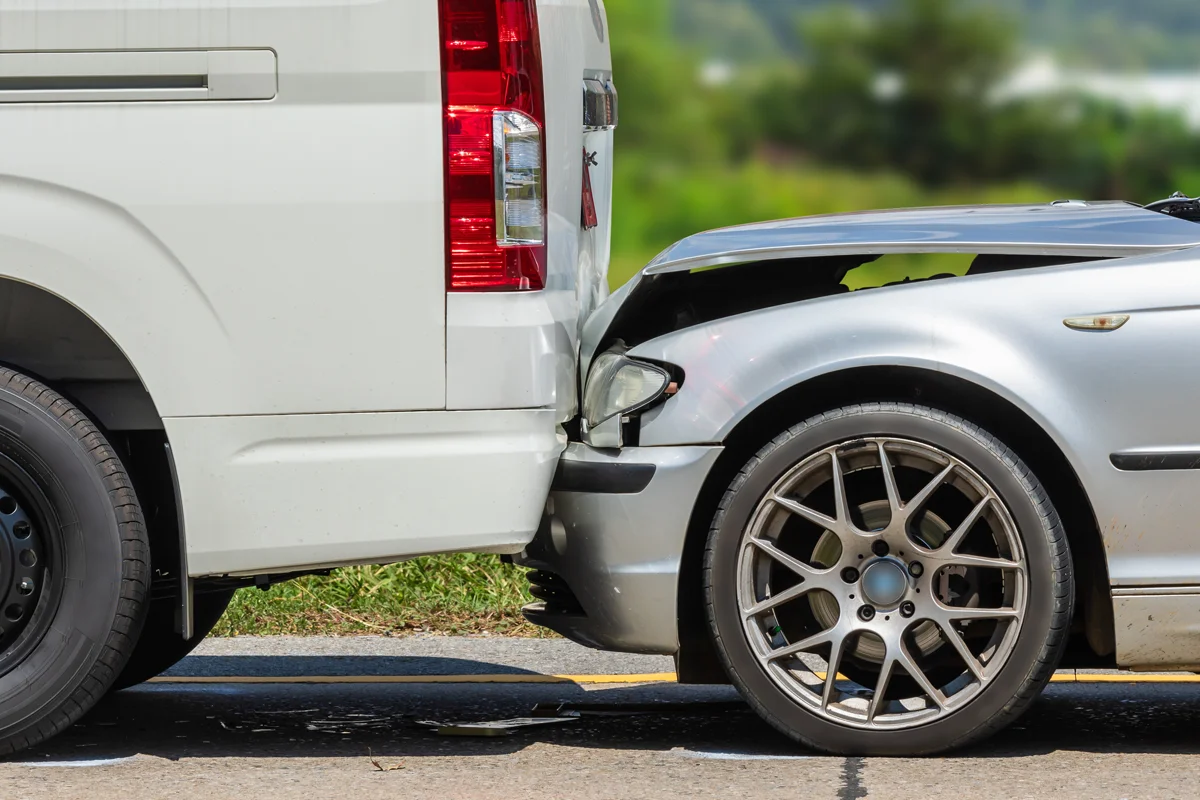 Crash between a passenger car and delivery van representing an Amazon delivery truck accident lawyer claim